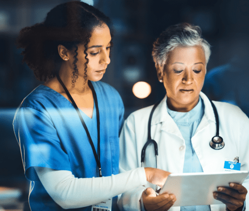 health care employees playing on an ipad