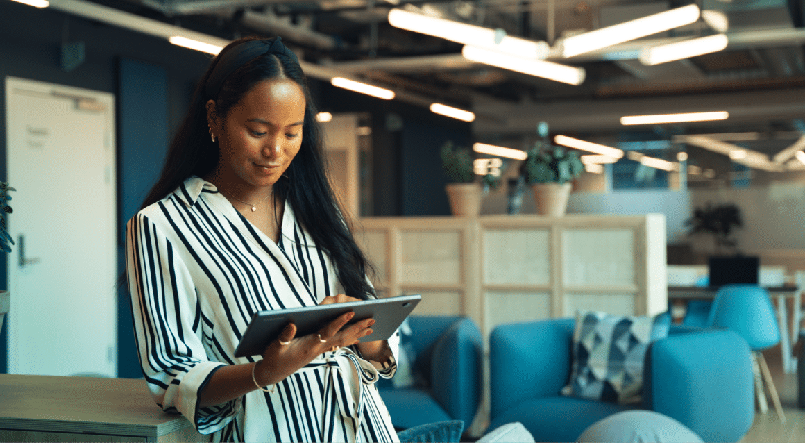 woman looking at ipad